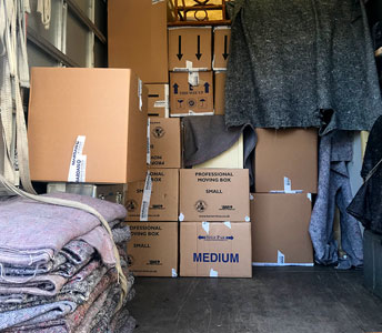 Packing up boxes for a removal in Bath